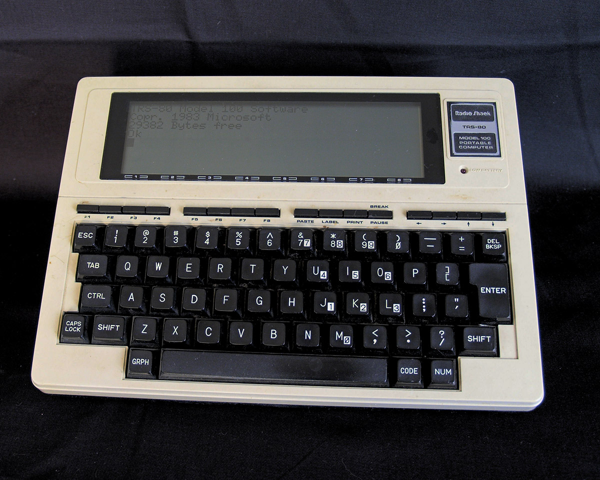 TRS-80 Model 100 with startup screen
